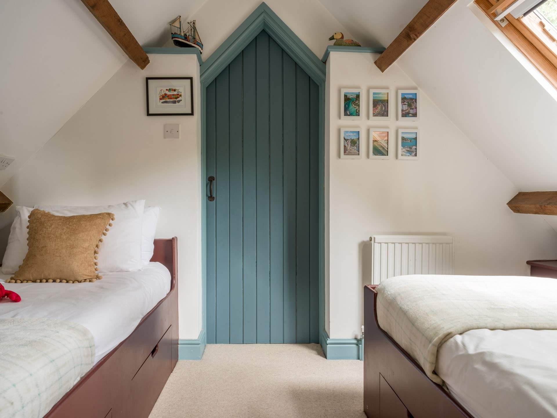 Head upstairs to the twin bedroom.