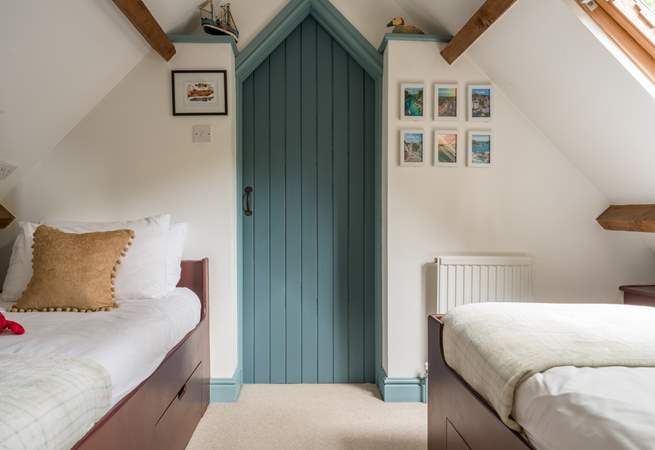 Head upstairs to the twin bedroom.