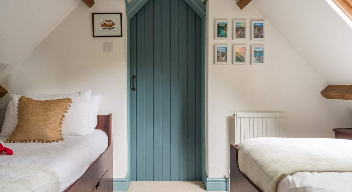 Head upstairs to the twin bedroom.