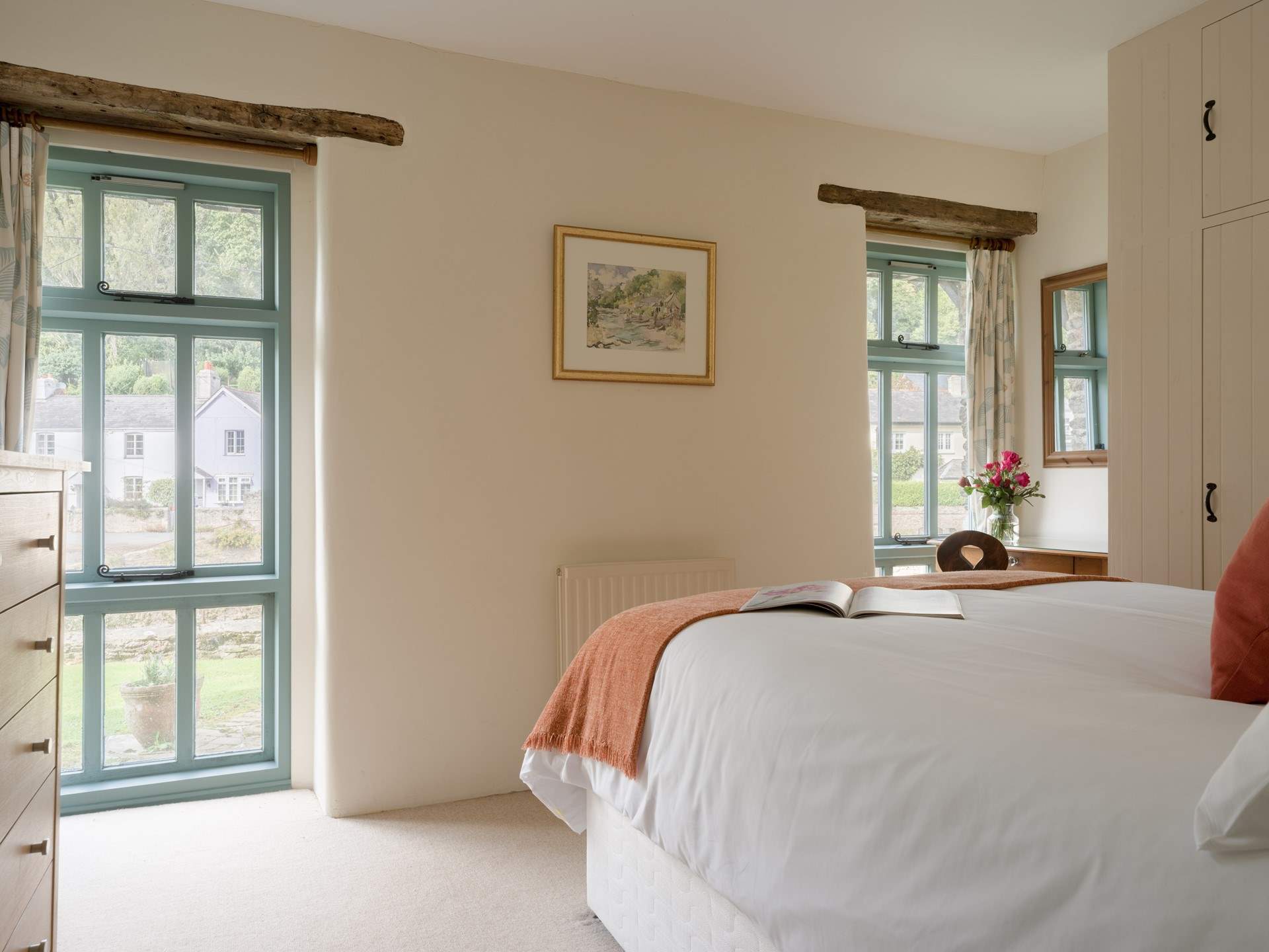 The floor to ceiling windows let the light in and provide a lovely view whilst enjoying breakfast in bed.