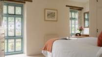 The floor to ceiling windows let the light in and provide a lovely view whilst enjoying breakfast in bed.
