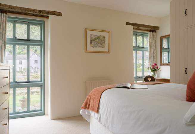 The floor to ceiling windows let the light in and provide a lovely view whilst enjoying breakfast in bed.