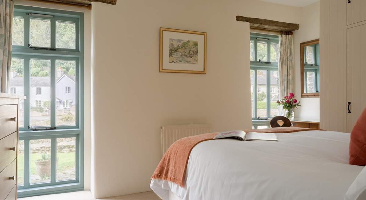 The floor to ceiling windows let the light in and provide a lovely view whilst enjoying breakfast in bed.