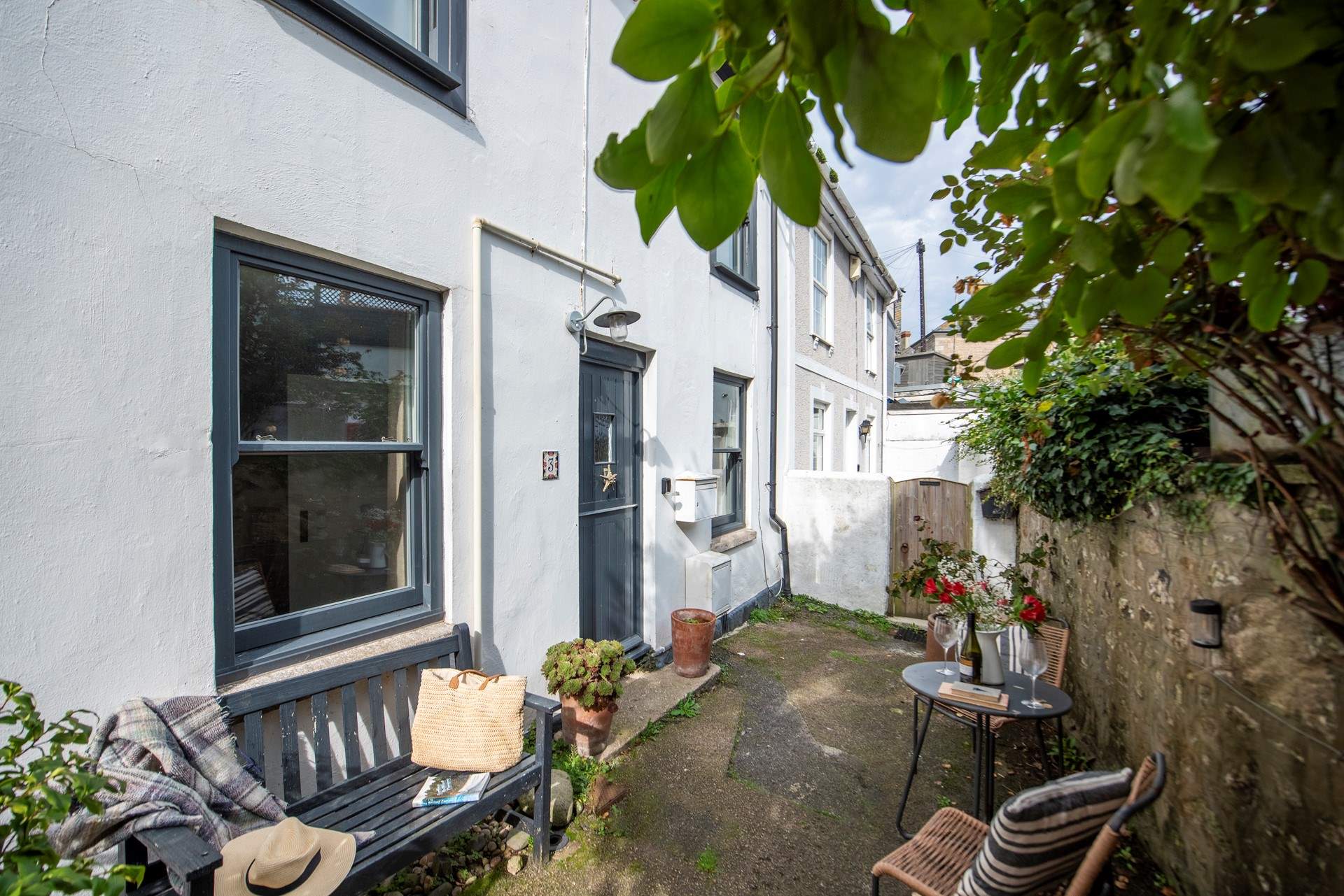3 Kelly's Gardens has a small courtyard, please note the neighbouring property has access to their home.