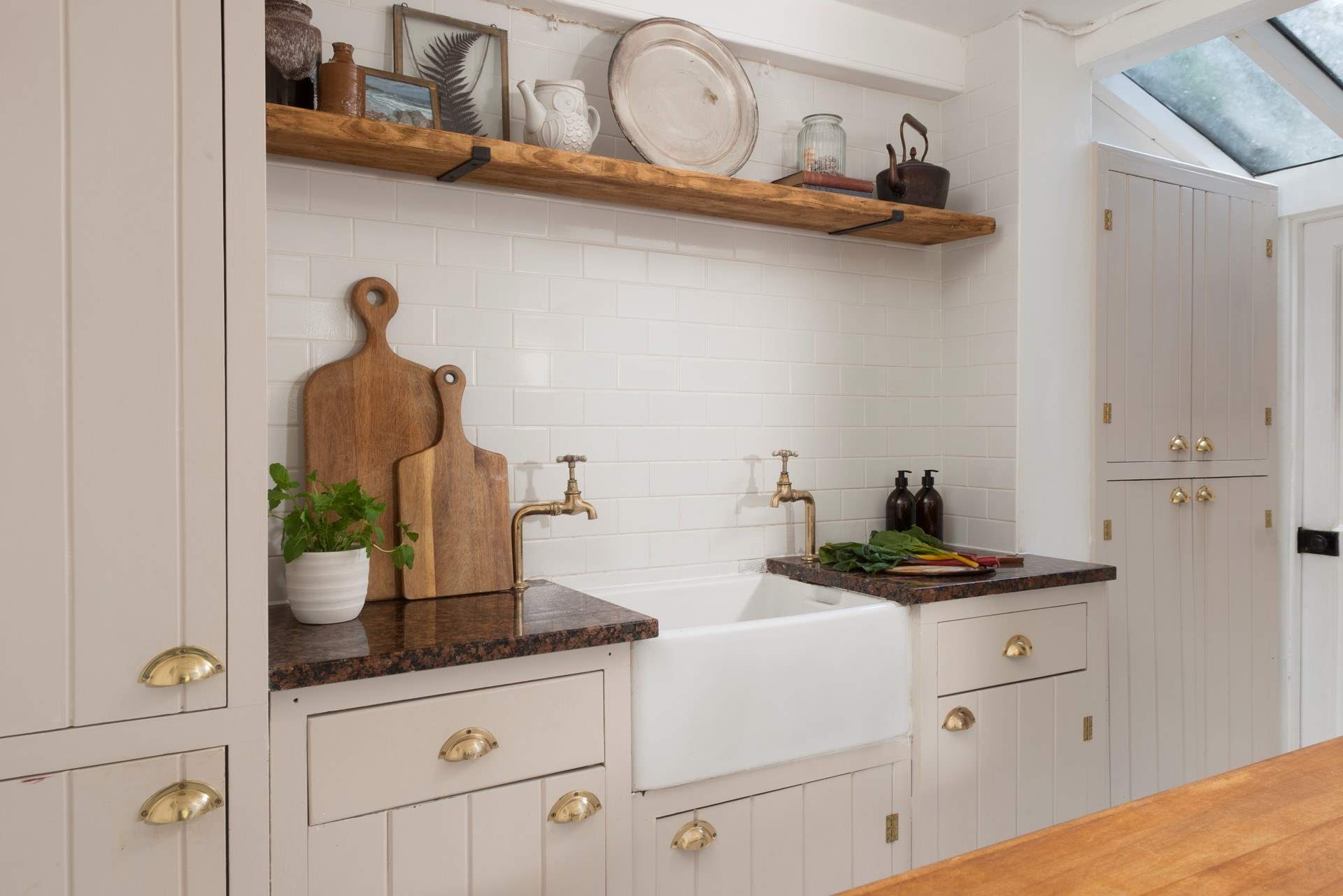 Contemporary comfort meets cottage character in this elegant kitchen space.