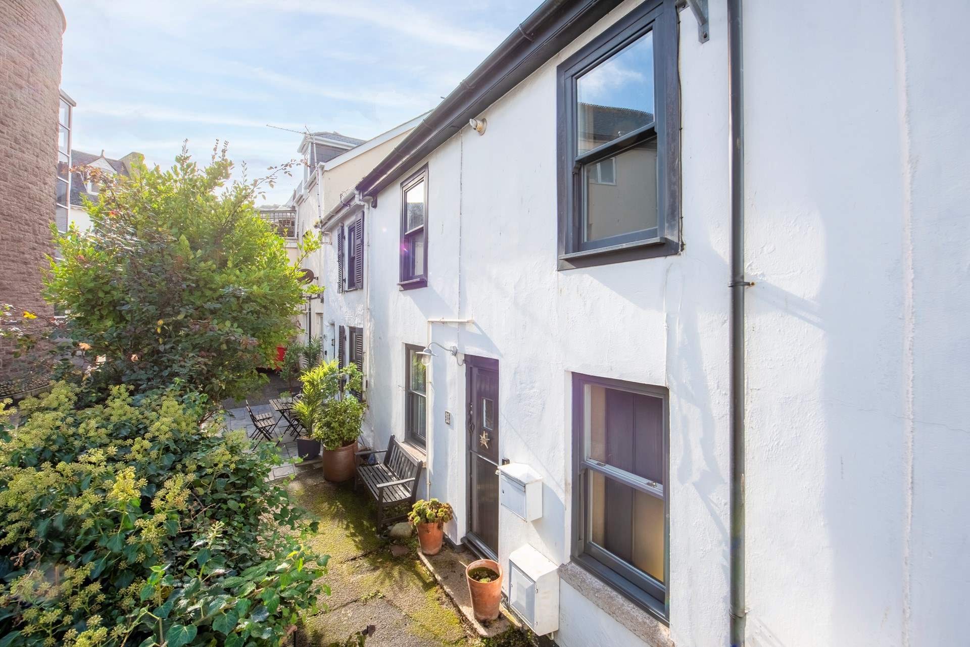 3 Kelly's Gardens has a small courtyard, please note the neighbouring property has access to their home, the courtyard is secured by a gate so safe for your four legged friends.