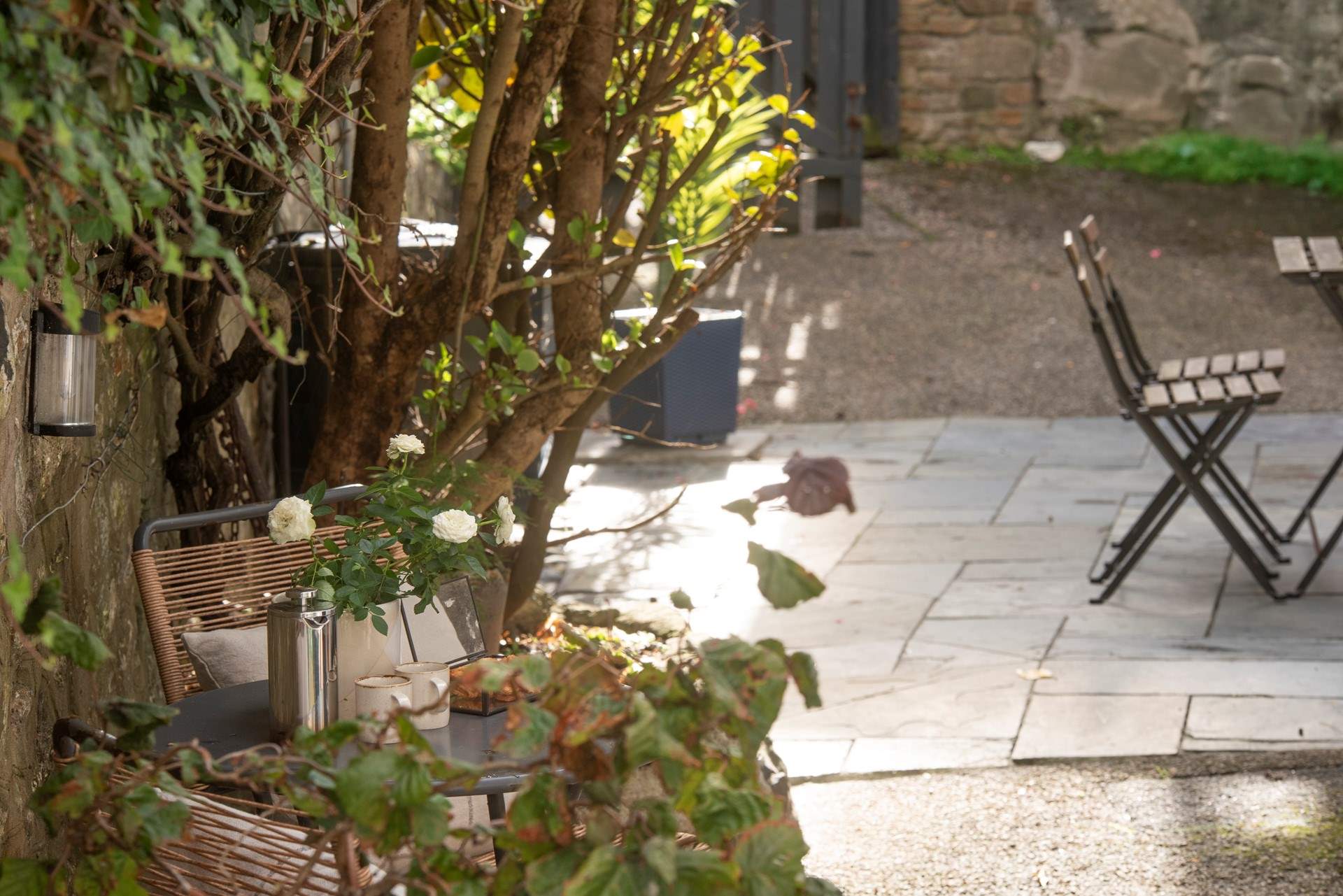 Enjoy a glass of wine in the courtyard.