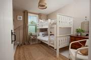 Bedroom 2 has sweet bunk-beds - perfect for little guests.