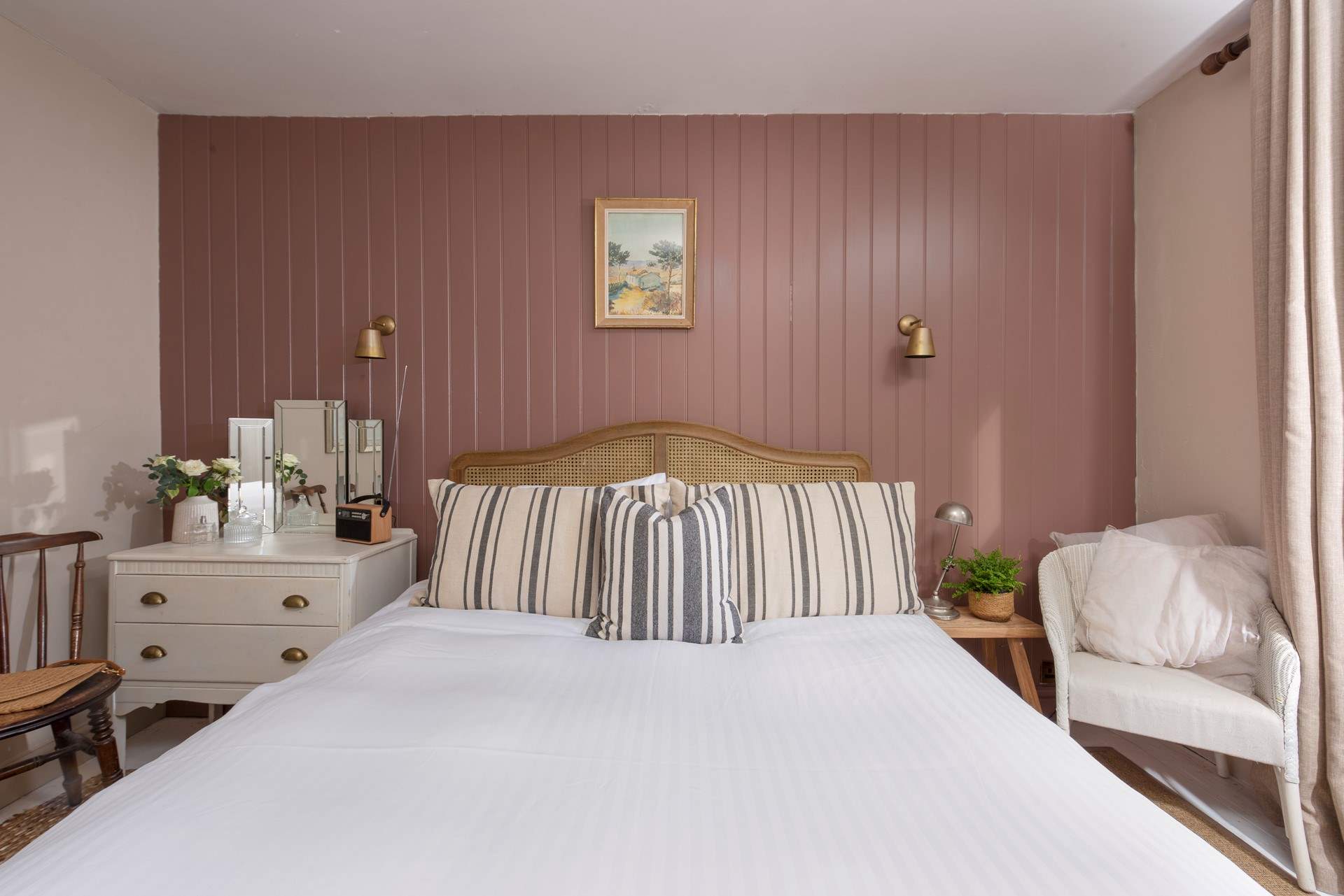  An elegantly styled bedroom designed for restful nights and lazy mornings.