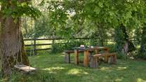 Watch the little ones playing on the rope swing while enjoying your morning coffee.
