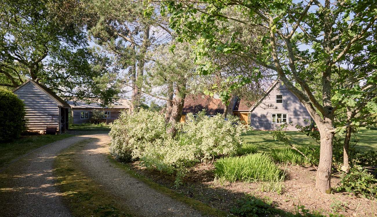 The drive leads to this stunning cottage that you will not want to leave.