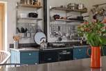 You can choose to cook with the oil-fired AGA, the electric oven or the gas hob.