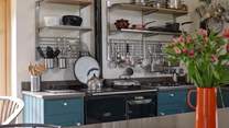 You can choose to cook with the oil-fired AGA, the electric oven or the gas hob.