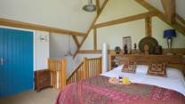 Principal bedroom with king-size double bed.