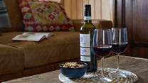 Sink into the sofa with a good book and a glass of wine.