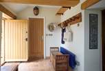Handy cloakroom area for coats, wellies, dirty walking shoes and sandy beach items.