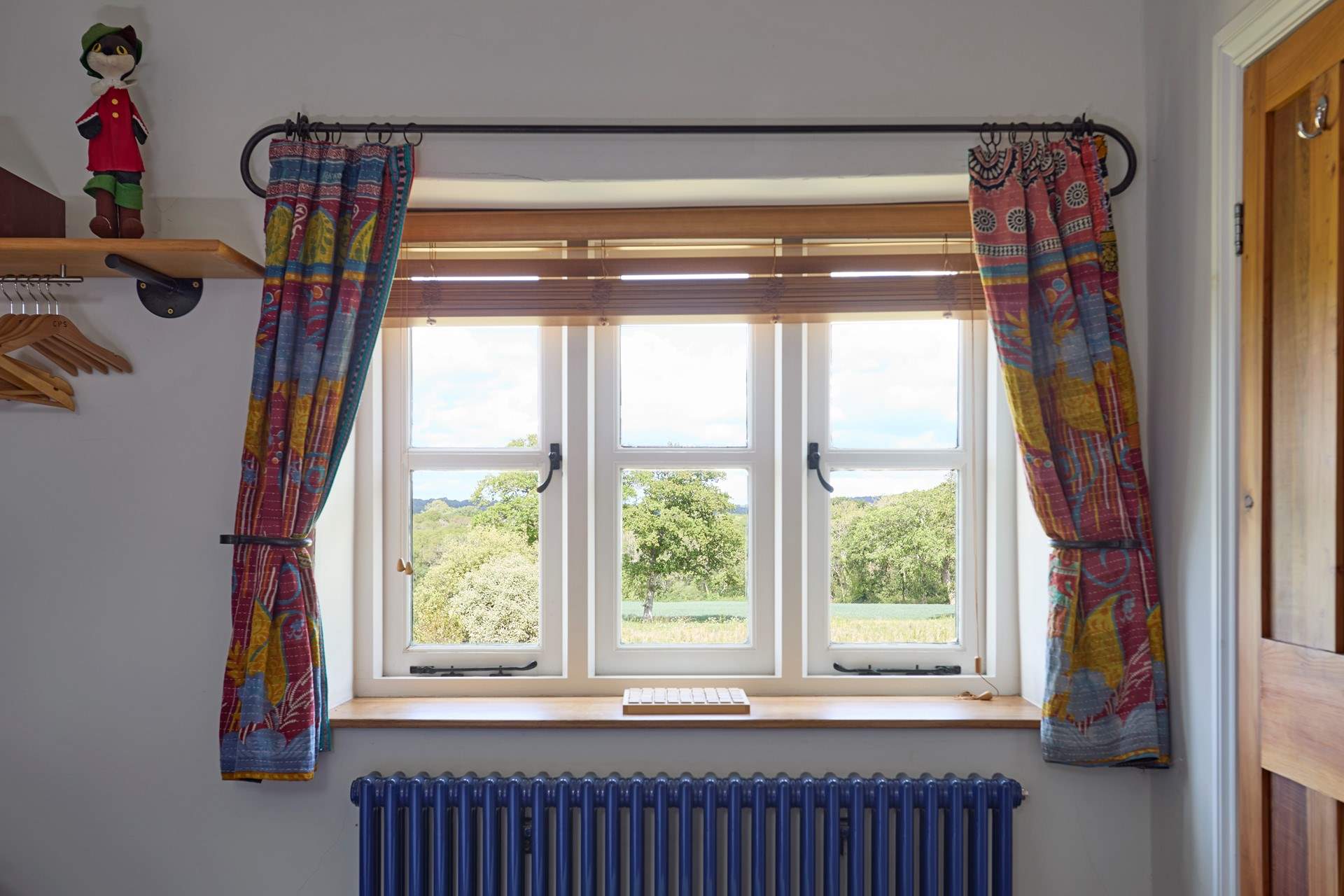 With pretty views over the garden and beyond.