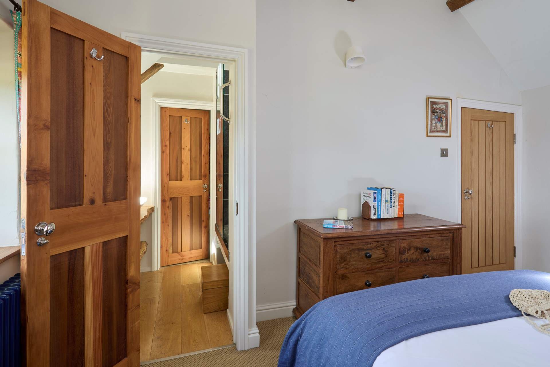 This shower-room is shared between bedrooms 3 and 4 - please note there is a large moveable step to help you access the shared shower (as shown in photo).