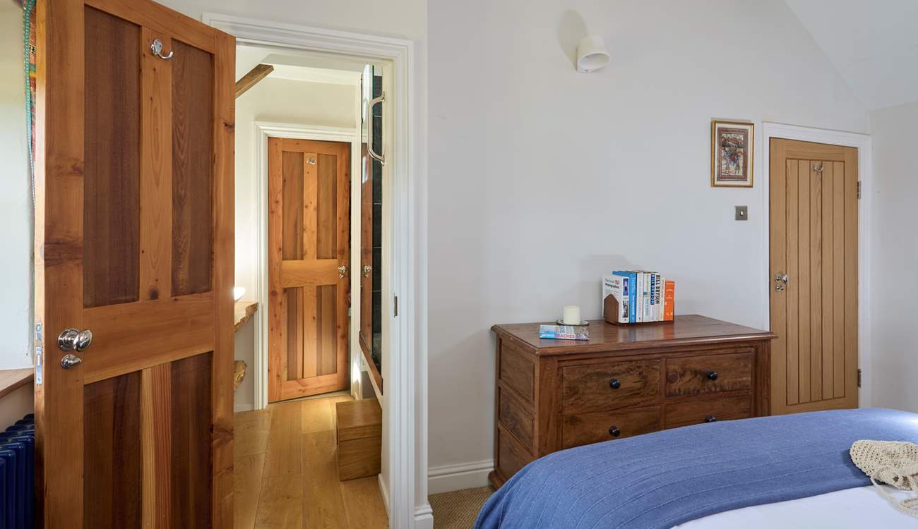 This shower-room is shared between bedrooms 3 and 4 - please note there is a large moveable step to help you access the shared shower (as shown in photo).