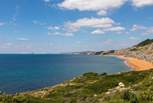 Looking towards Compton Bay. This magnificent coastline often has perfect conditions for surfers and paragliders, and the miles of beach are perfect for dog walkers.