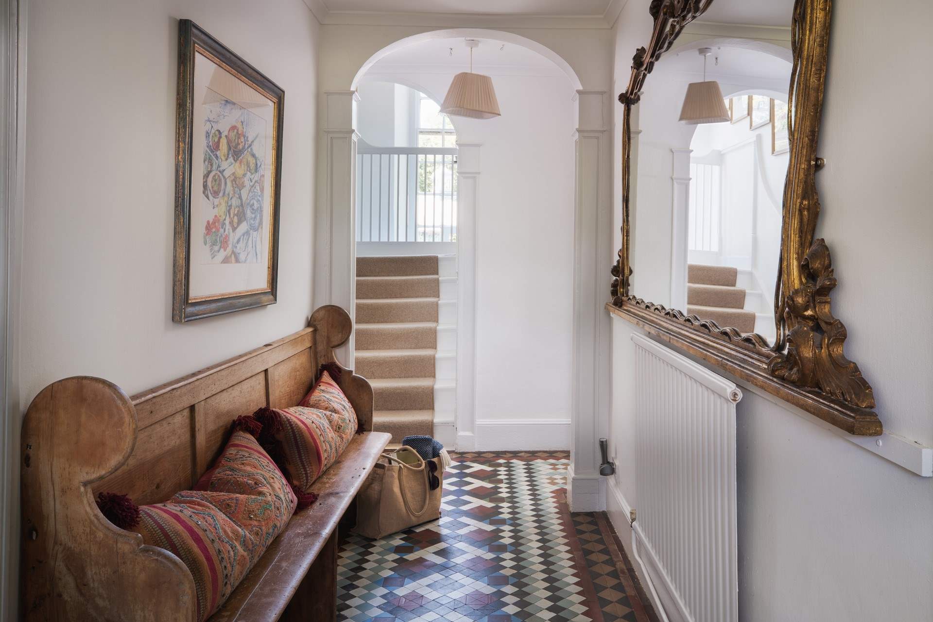 The tiled floor in the hallway is stunning.