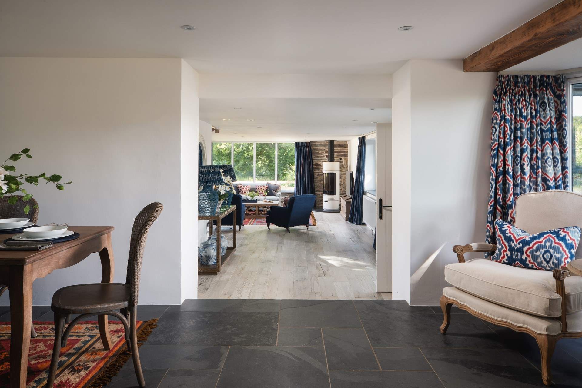 The dining and kitchen areas are a couple of steps up from the sitting-area.