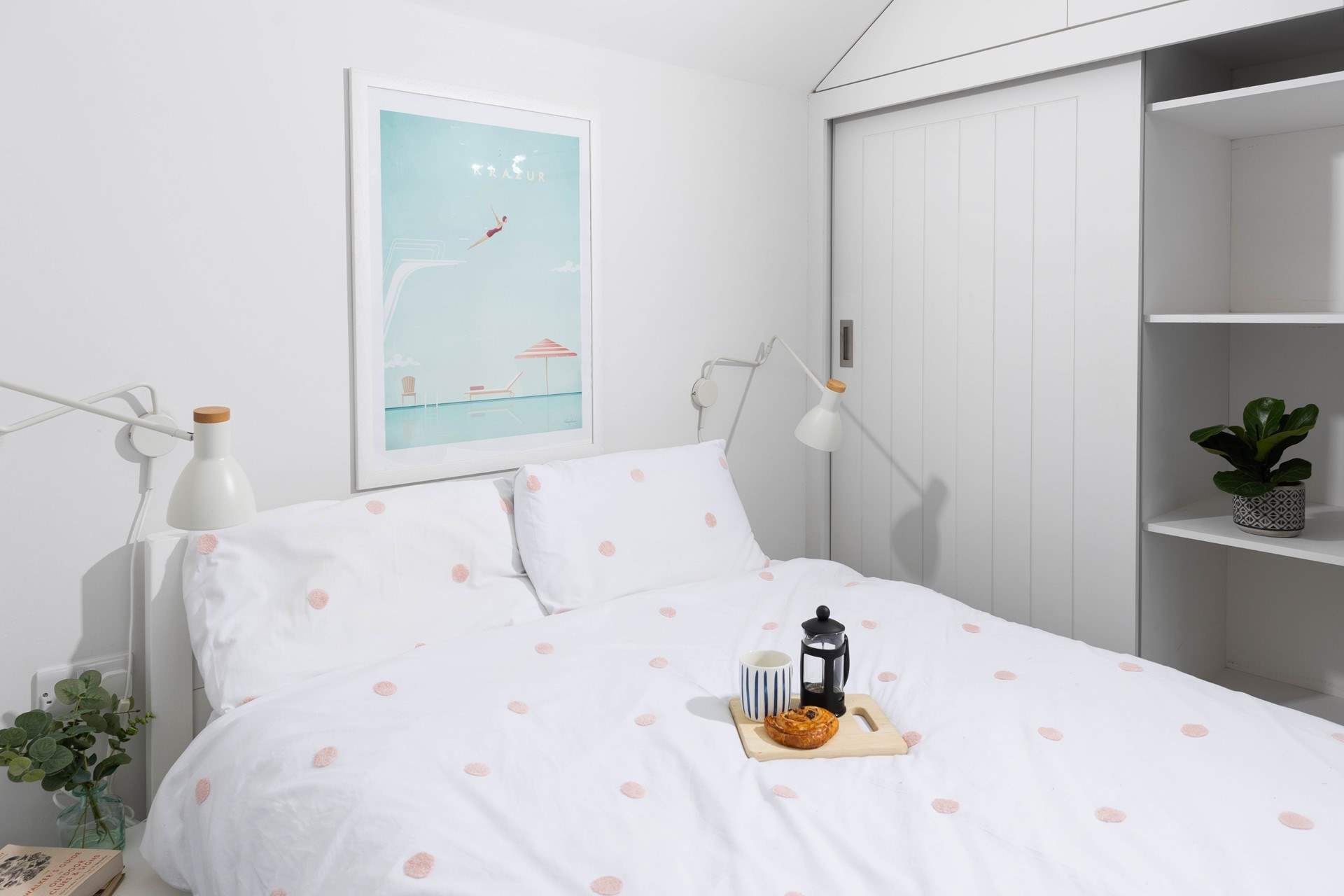 This calming bedroom is decorated in tranquil tones for a good night's slumber. 