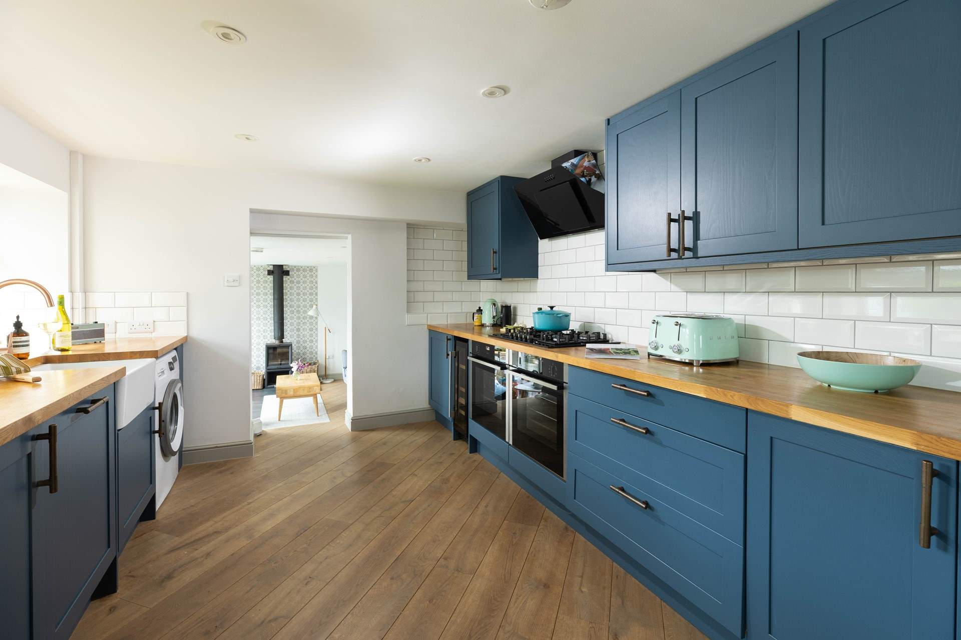This fabulous kitchen has everything you might need, including a wine fridge. 