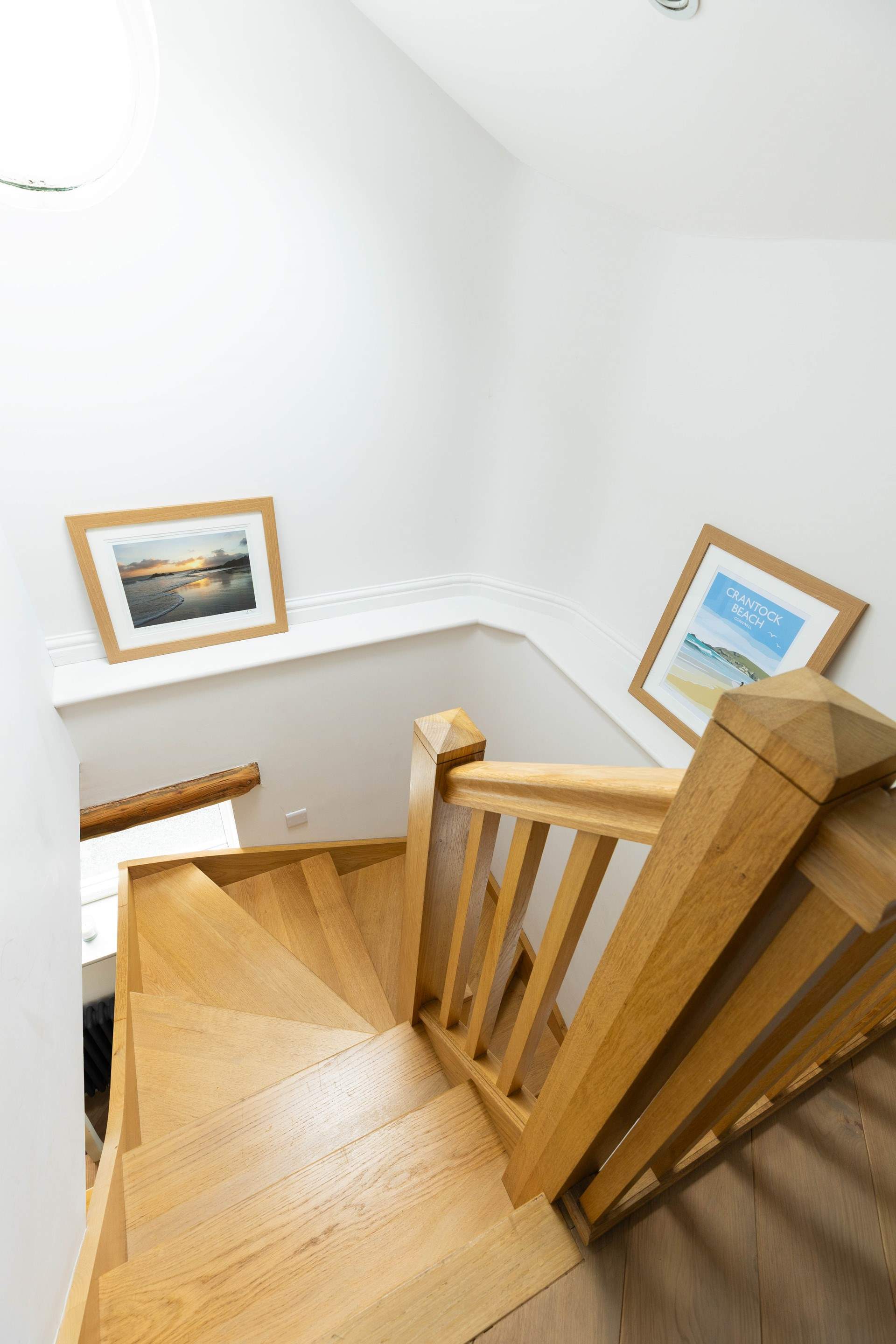 Beautiful stairs lead to the main bedroom. 
