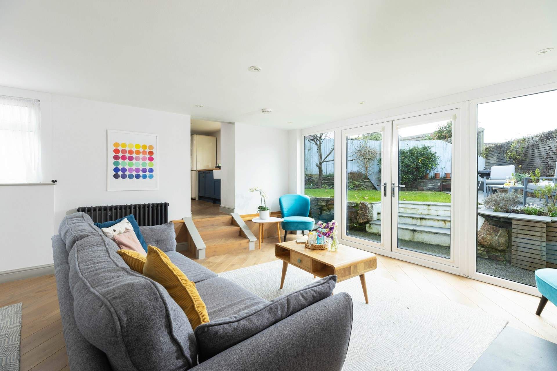 This lovely and light room looks out over the garden. 