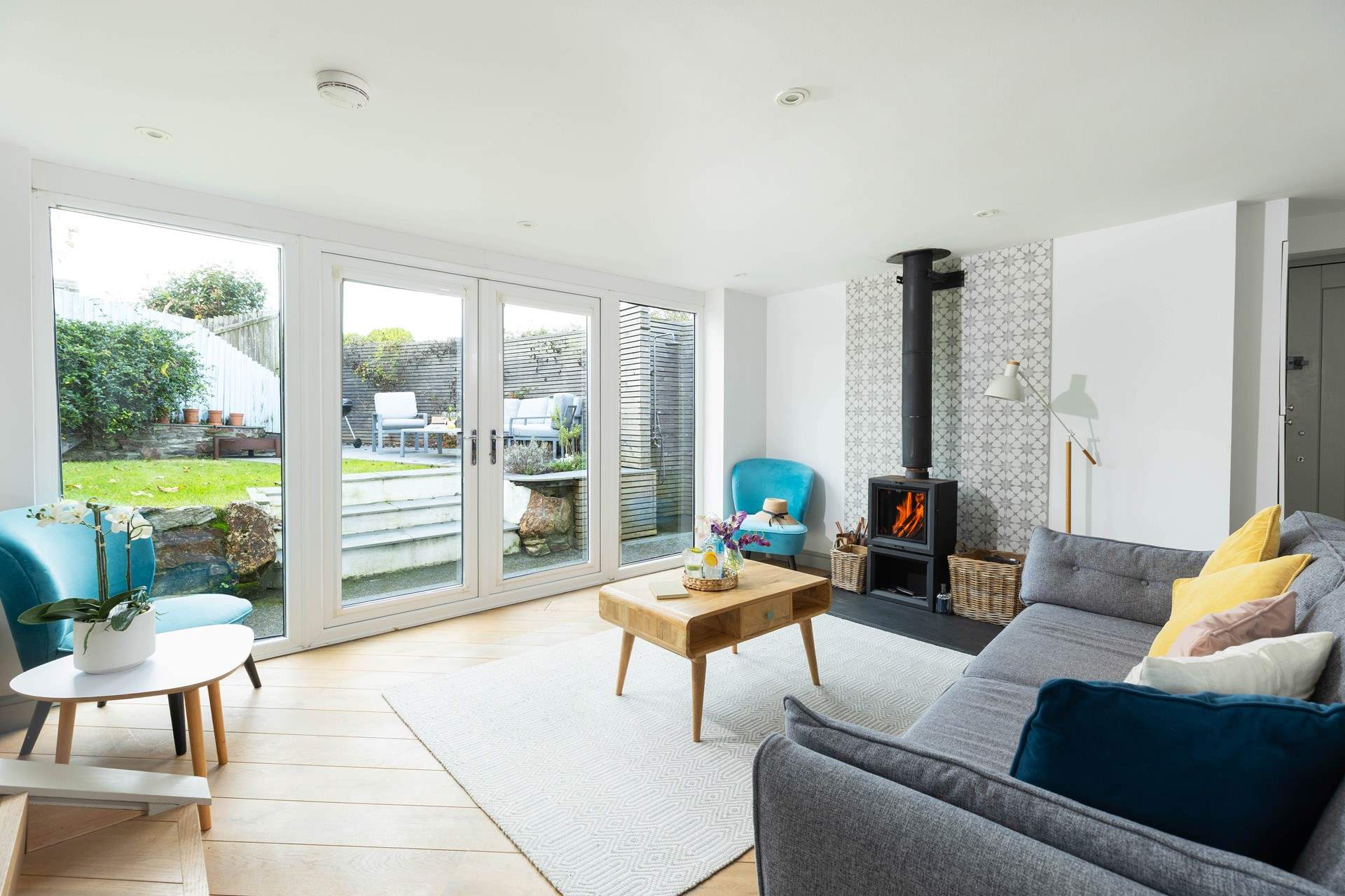 Open the double doors to the sheltered garden at Seaview Cottage. 