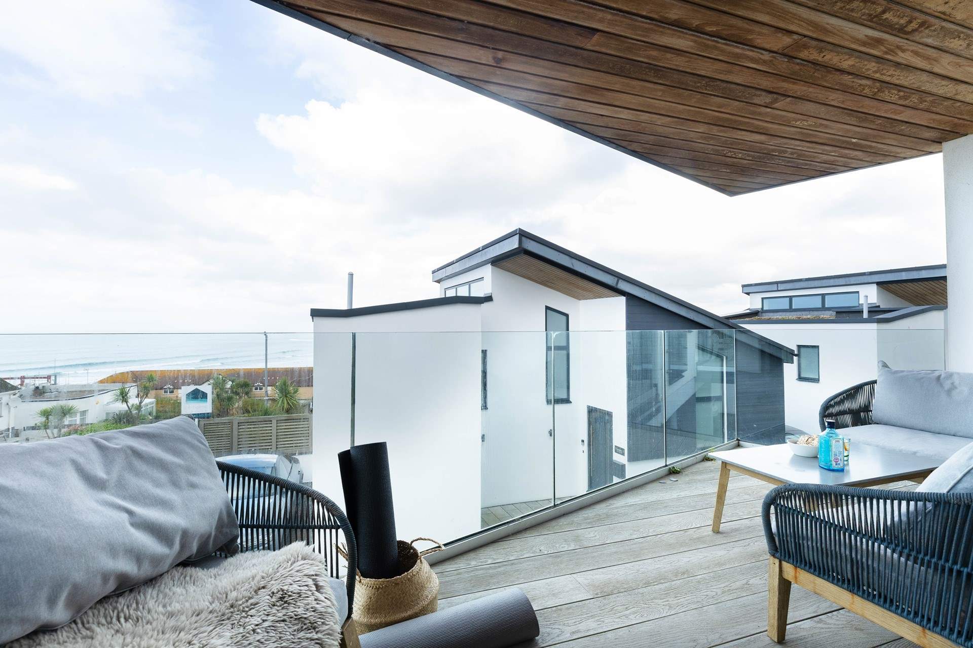 The balcony has comfy seating to enjoy a sundowner on. 