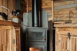 The toasty wood-burner adds warmth throughout.