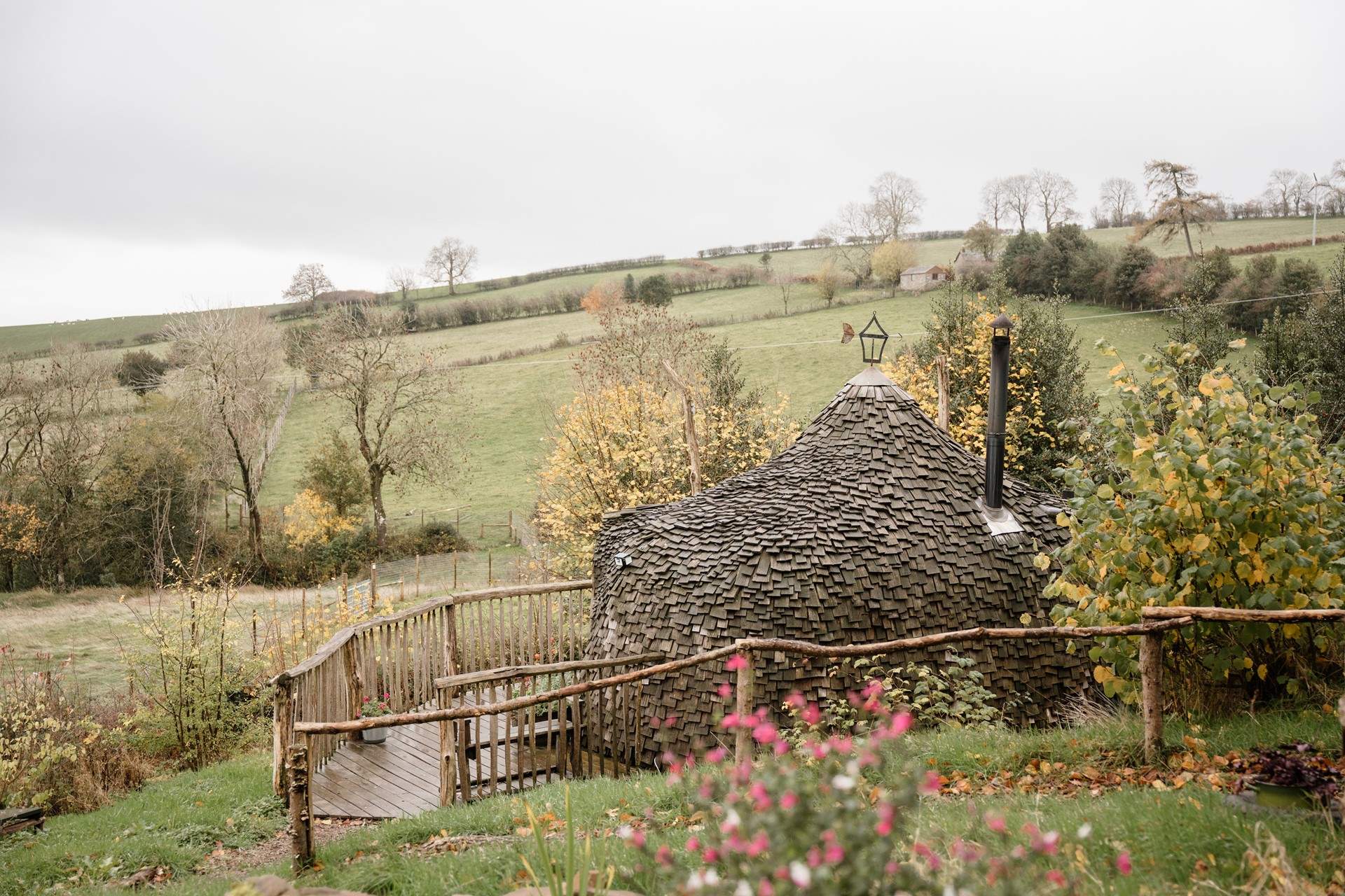 With breathtaking views across rolling countryside and patchwork fields.