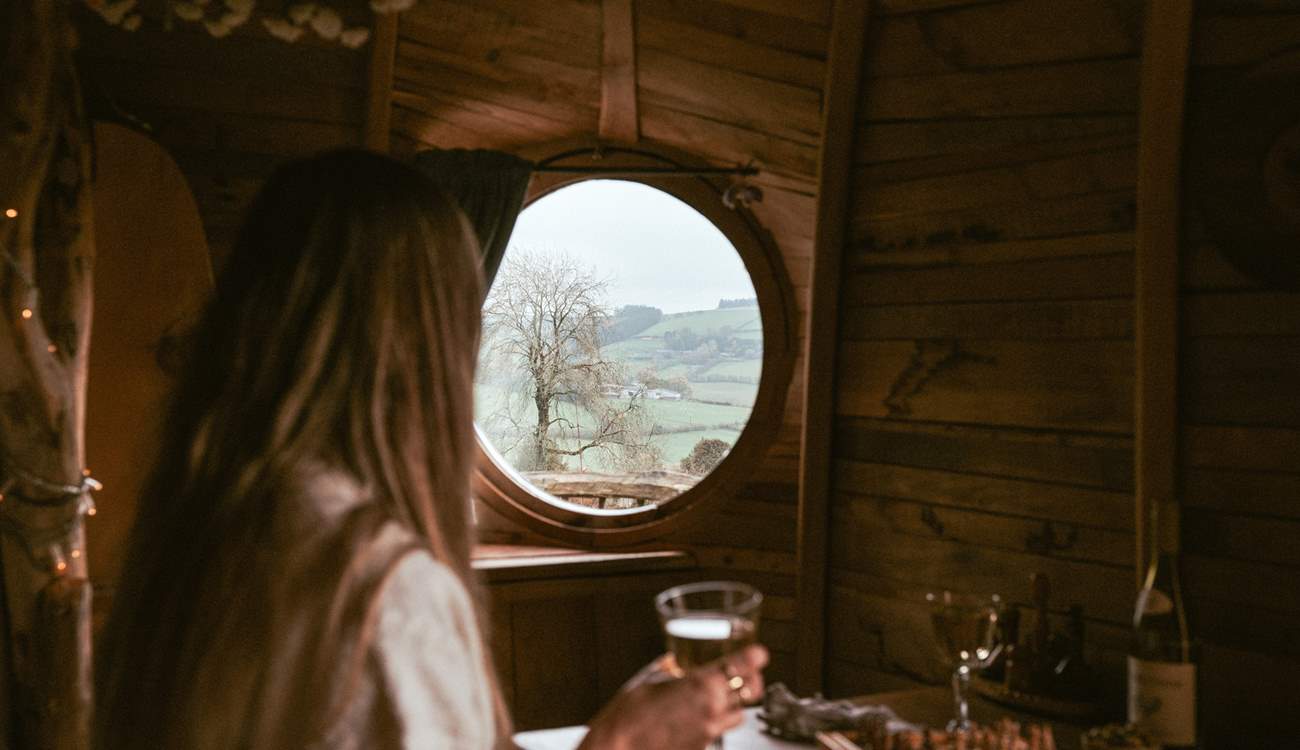 Gaze out over the fields as the sun dips below the rolling hills.