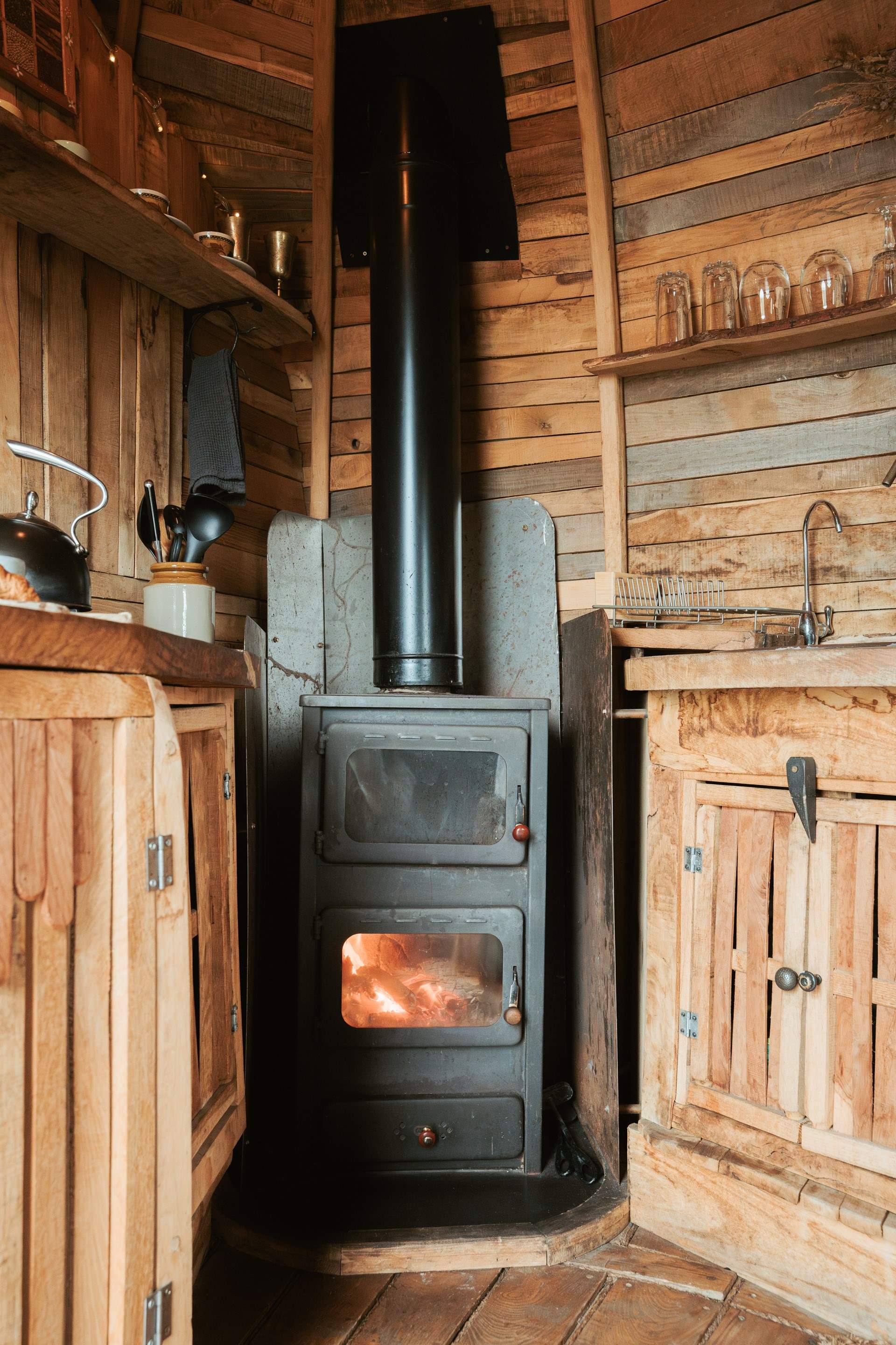 The toasty wood-burner adds warmth throughout.