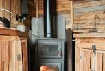The toasty wood-burner adds warmth throughout.
