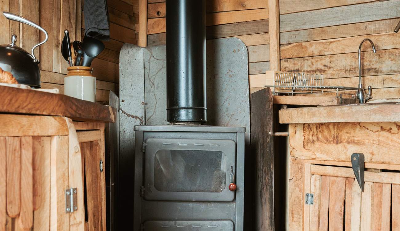 The toasty wood-burner adds warmth throughout.