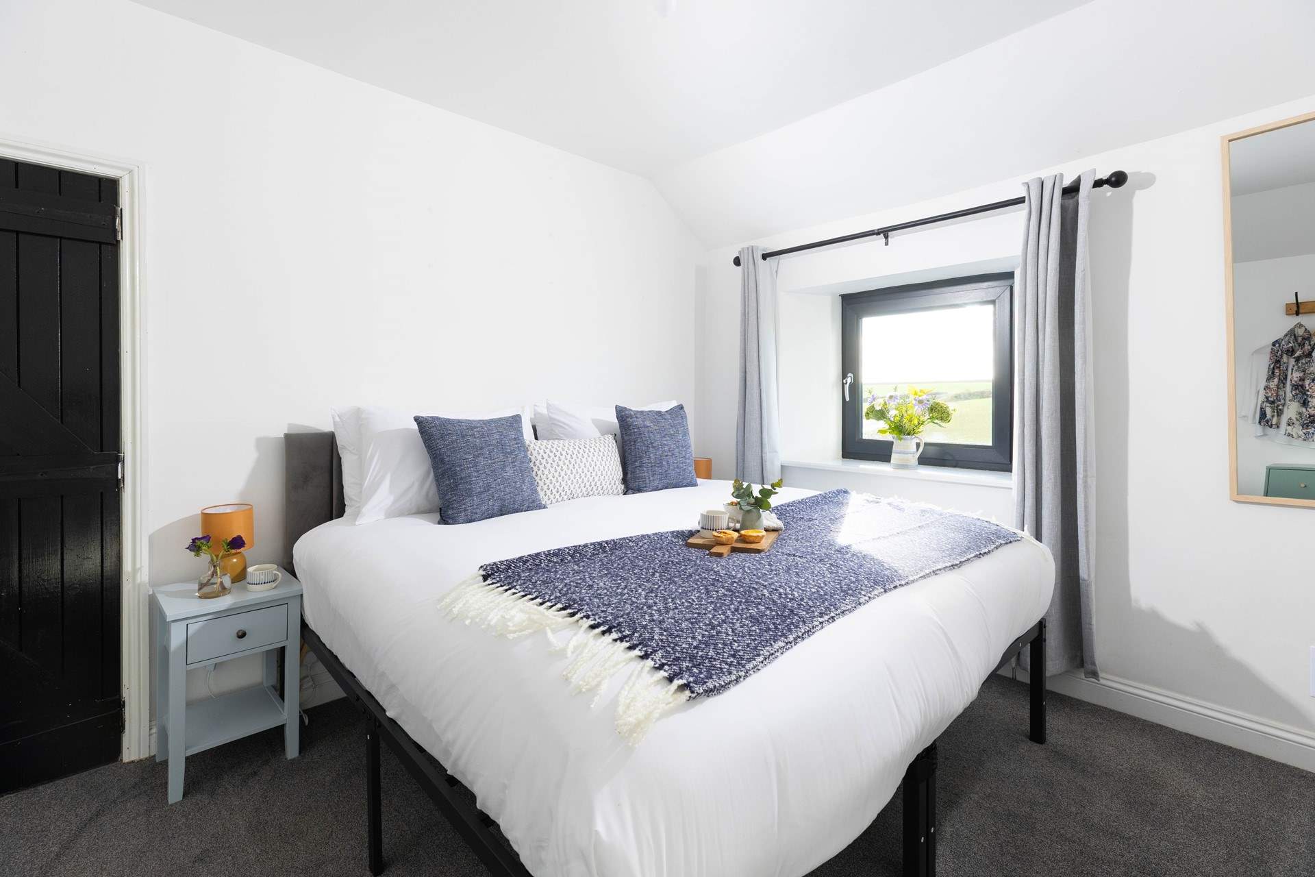 Bedroom 2 has a 'zip and link' bed. There is a step into this room. 