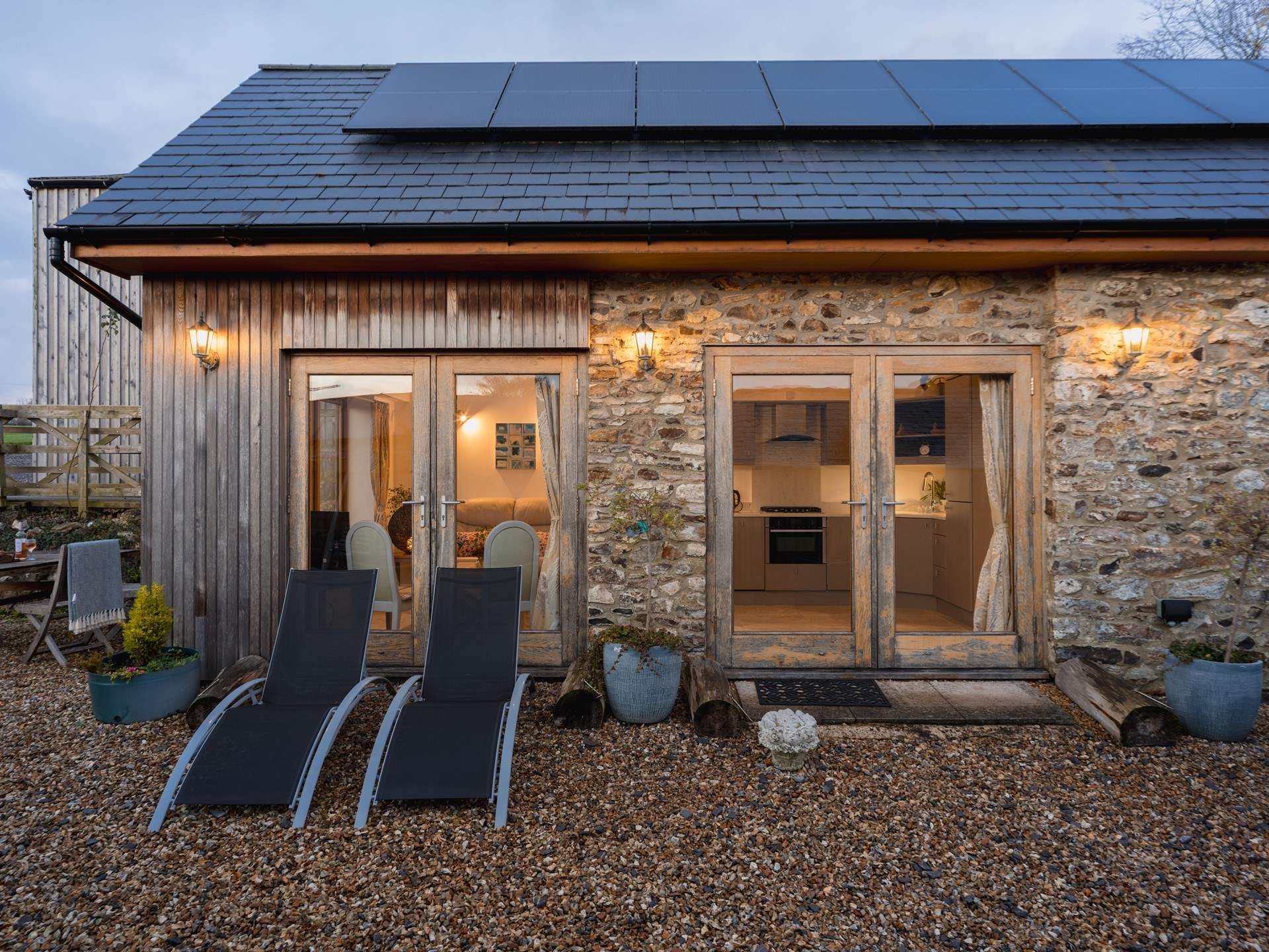As the day winds down the soft lighting of The Stables creates such an inviting spot for some outdoor dining and a glass of something nice to watch the sun go down...