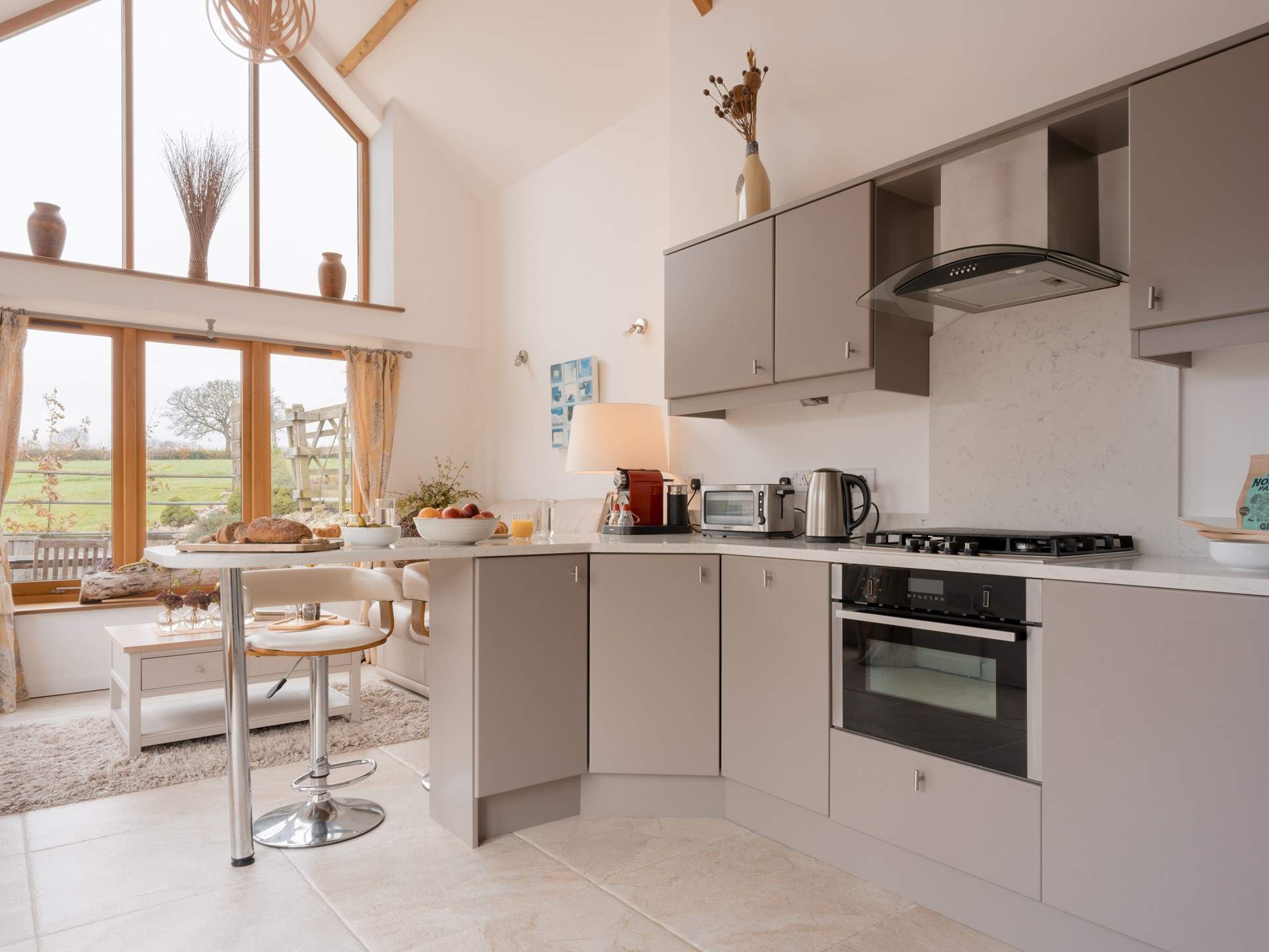 Conveniently located off the living area the high spec kitchen has all you need to cook up a storm or just enjoy a lazy brunch at the breakfast-bar.