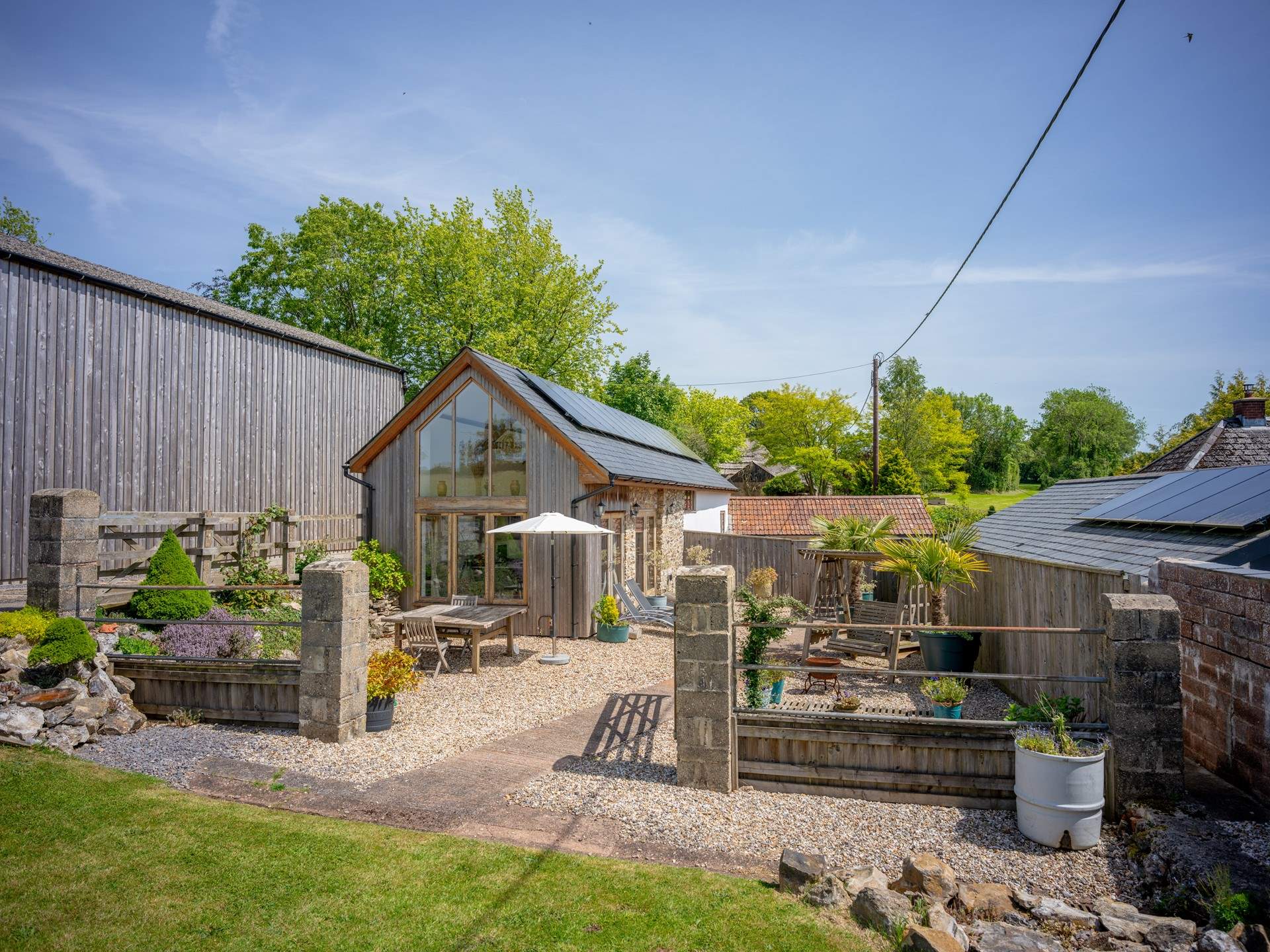 As viewed from the paddock. The Stables has a wonderful private outdoor space, complete with sun-loungers, seating and a fire-pit. What a spot for peace, quiet and perhaps a spot of star gazing...