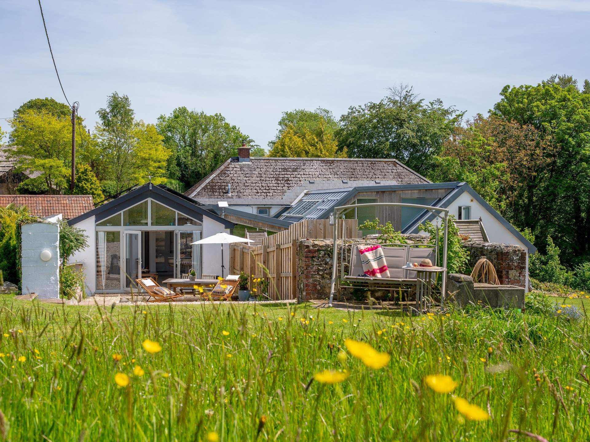 This converted cowshed is tucked perfectly within the grounds of a quiet farm and next door to its sister property, The Stables (also available to book).