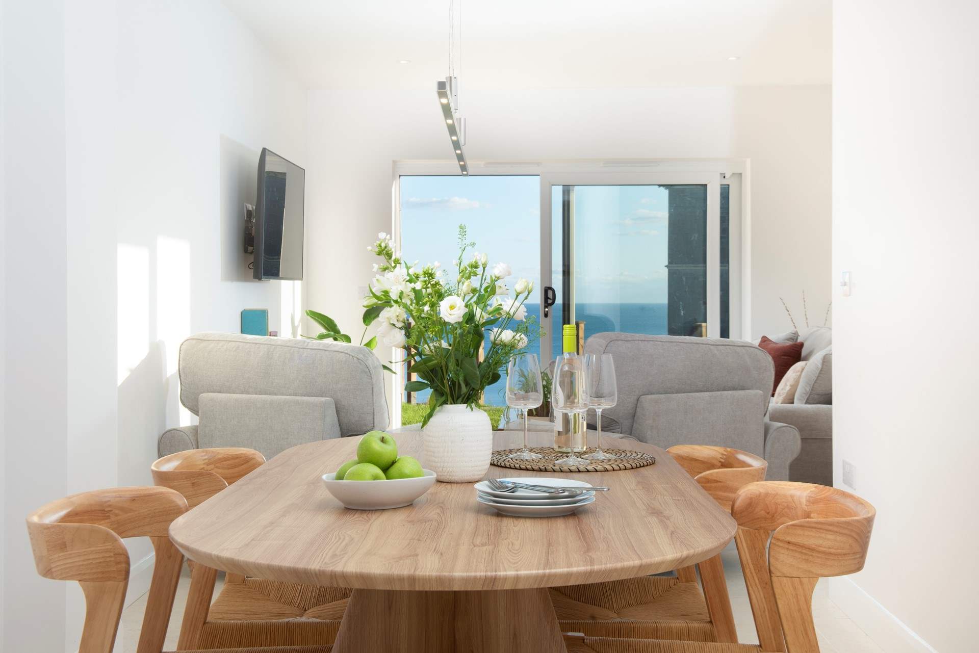 Enjoy holiday laughter and meals together at the dining-table.