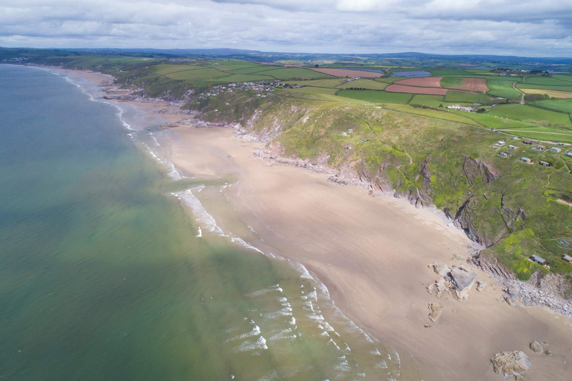 When the tide is out the beach at Whitsand Bay stretches for three miles.