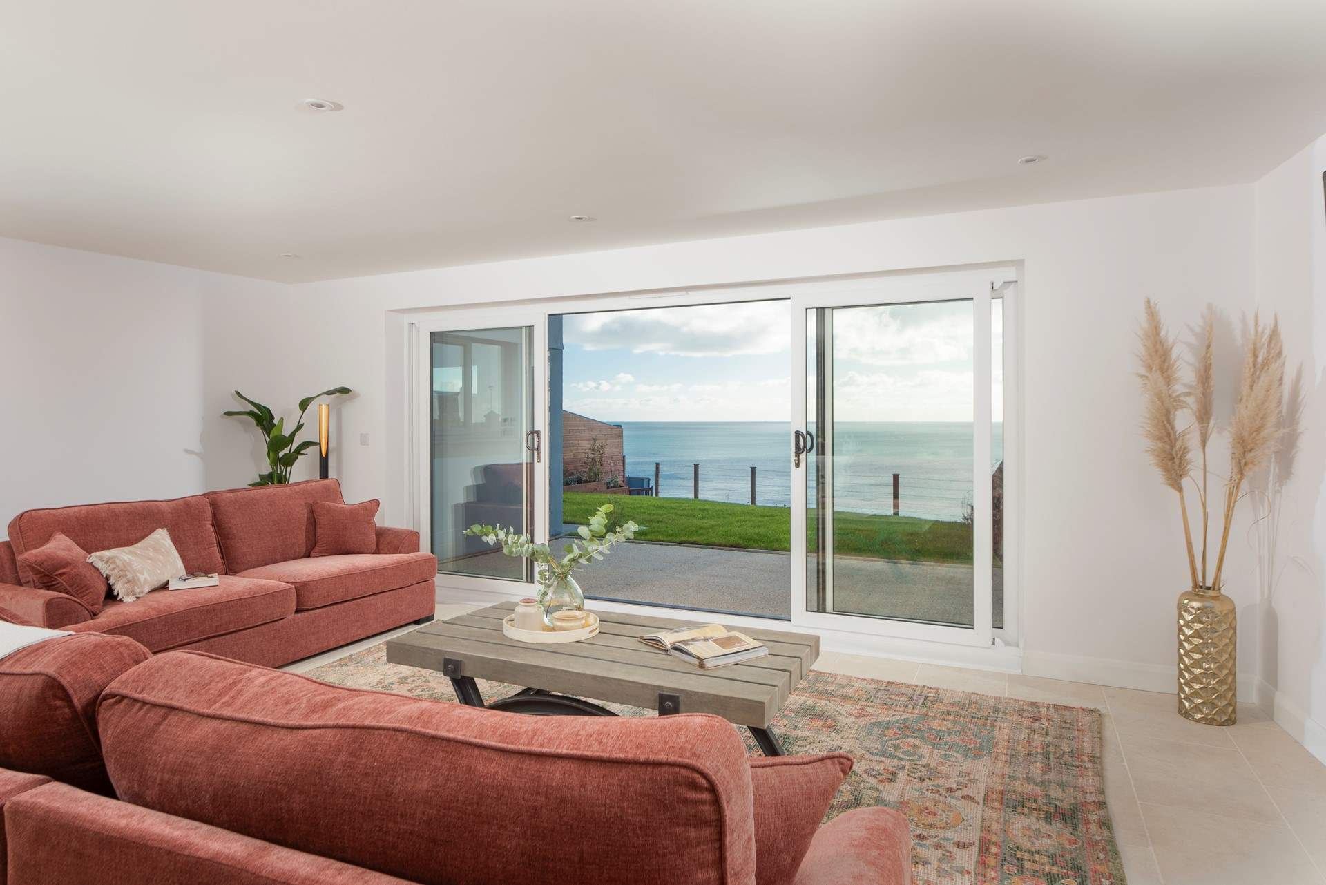 Relax on the sofas and soak in the view.