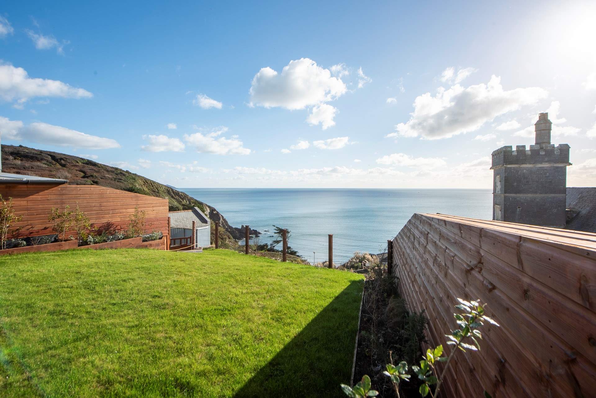 The gate at the end of the garden leads you down to the spa.