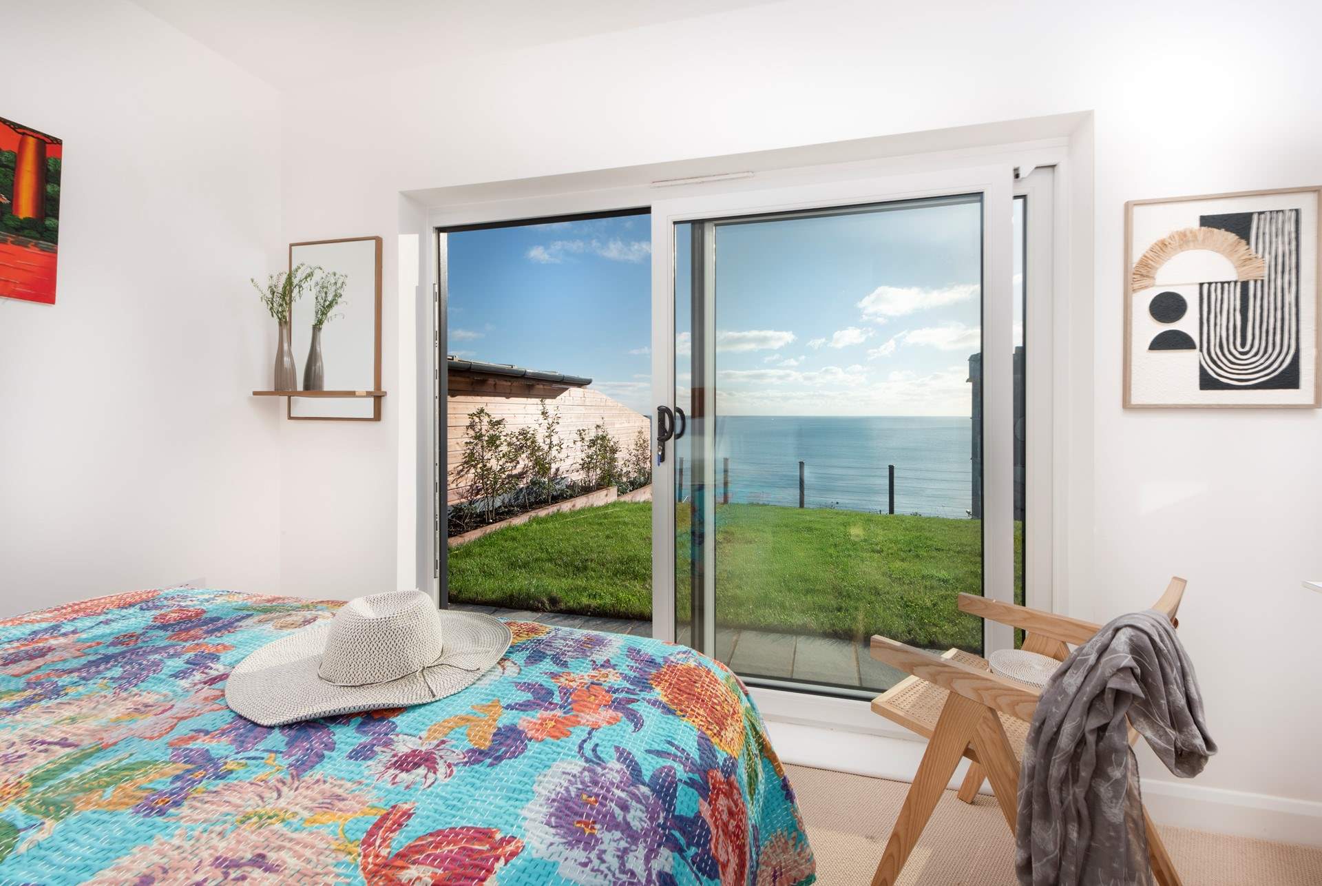 There's a choice of four bedrooms at Cornica, two taking pride of place at the front of the house, making the most of the view.