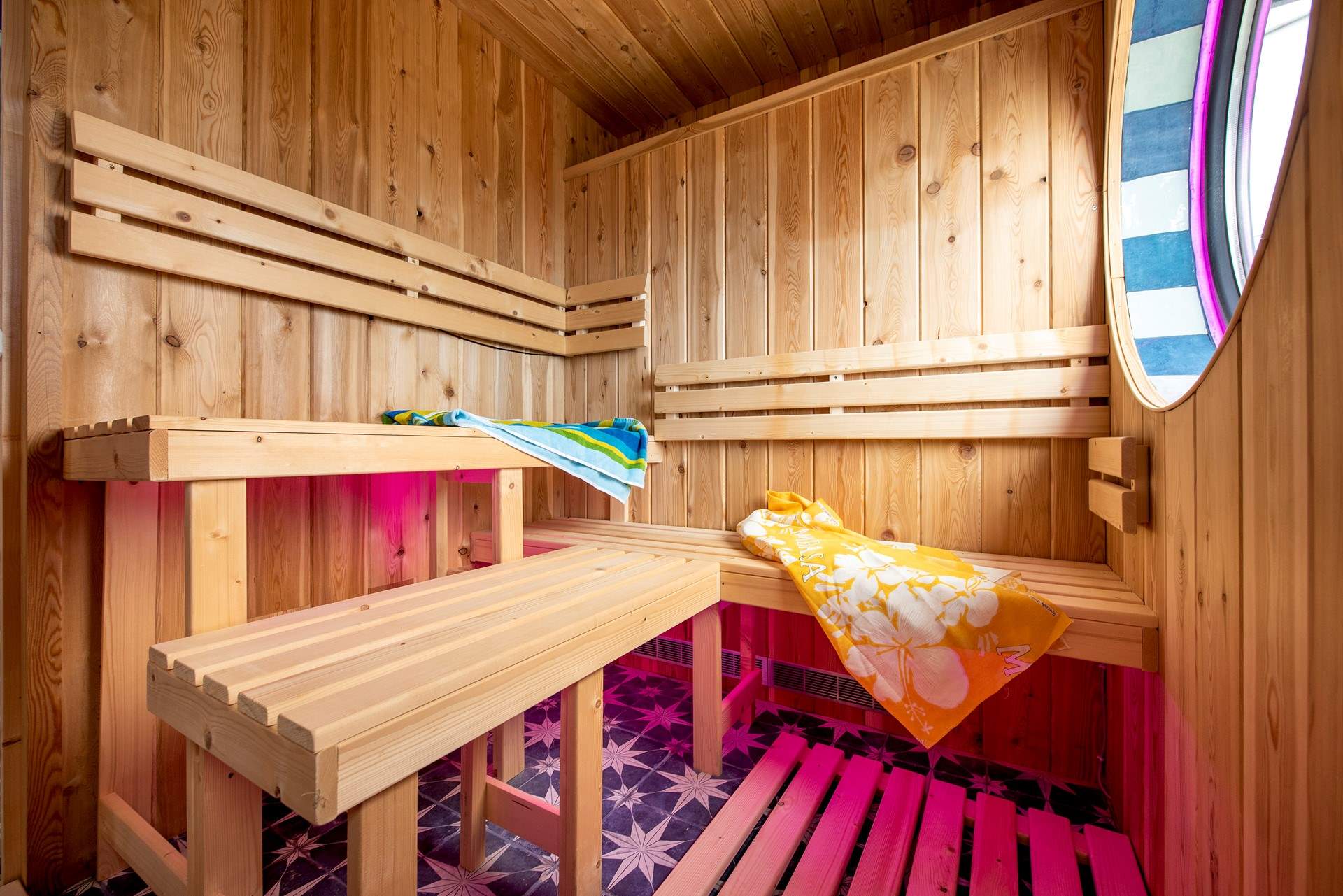 Look out over the sea as you sip some bubbles and enjoy the sauna.