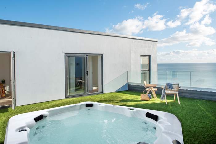 Cornica is a 4 bedroom, dog friendly cottage with sea views near Whitsand Bay.